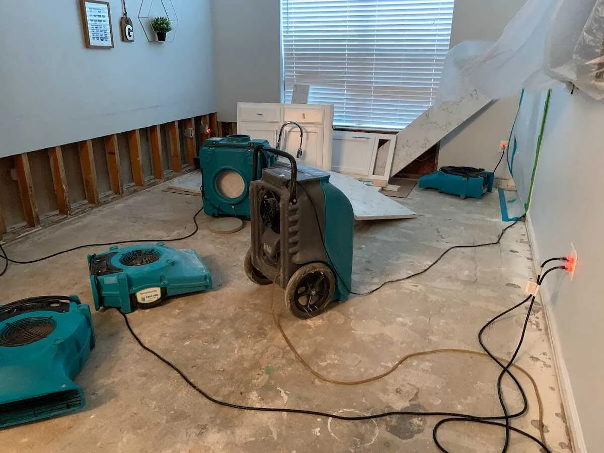 Dehumidifier in flood-cut room for Water Damage Restoration in Blackhawk